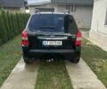 Черный Хендай Туксон, объемом двигателя 2 л и пробегом 255 тыс. км за 8300 $, фото 2 на Automoto.ua