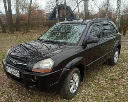 Черный Хендай Туксон, объемом двигателя 1.98 л и пробегом 300 тыс. км за 6800 $, фото 9 на Automoto.ua