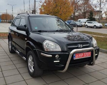 Черный Хендай Туксон, объемом двигателя 1.98 л и пробегом 214 тыс. км за 7700 $, фото 6 на Automoto.ua