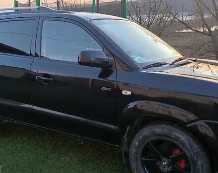 Черный Хендай Туксон, объемом двигателя 1.99 л и пробегом 203 тыс. км за 8000 $, фото 1 на Automoto.ua