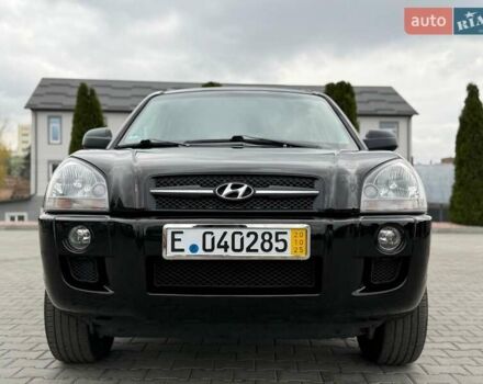 Черный Хендай Туксон, объемом двигателя 1.98 л и пробегом 239 тыс. км за 8700 $, фото 9 на Automoto.ua