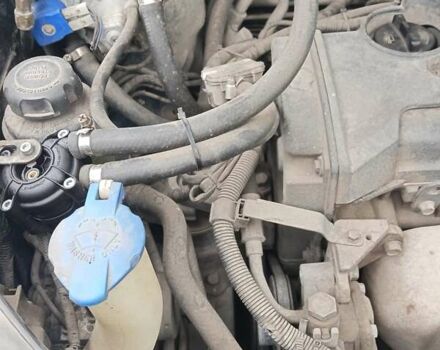 Черный Хендай Туксон, объемом двигателя 1.98 л и пробегом 157 тыс. км за 7500 $, фото 18 на Automoto.ua