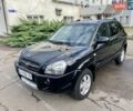 Черный Хендай Туксон, объемом двигателя 1.98 л и пробегом 172 тыс. км за 8500 $, фото 10 на Automoto.ua