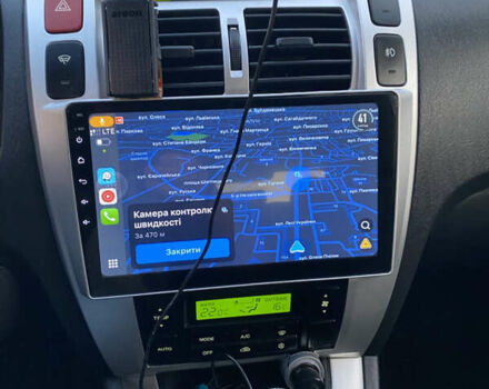 Черный Хендай Туксон, объемом двигателя 1.98 л и пробегом 254 тыс. км за 7700 $, фото 21 на Automoto.ua