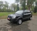 Чорний Хендай Туксон, об'ємом двигуна 2 л та пробігом 186 тис. км за 8300 $, фото 1 на Automoto.ua