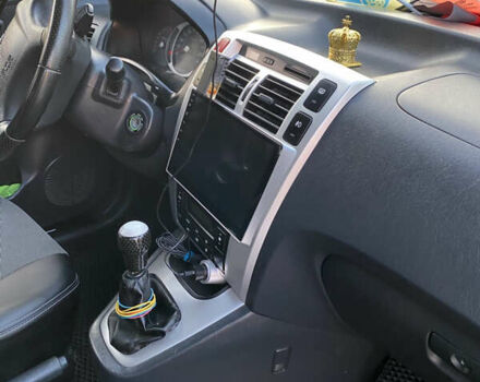 Черный Хендай Туксон, объемом двигателя 1.98 л и пробегом 254 тыс. км за 7700 $, фото 17 на Automoto.ua