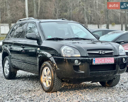 Черный Хендай Туксон, объемом двигателя 1.98 л и пробегом 96 тыс. км за 9900 $, фото 3 на Automoto.ua