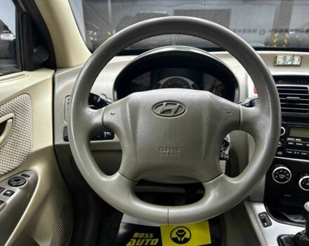 Черный Хендай Туксон, объемом двигателя 2 л и пробегом 224 тыс. км за 7800 $, фото 12 на Automoto.ua