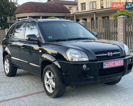 Черный Хендай Туксон, объемом двигателя 2 л и пробегом 250 тыс. км за 7950 $, фото 38 на Automoto.ua