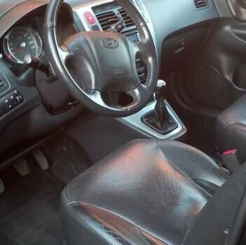 Черный Хендай Туксон, объемом двигателя 2 л и пробегом 187 тыс. км за 8800 $, фото 11 на Automoto.ua