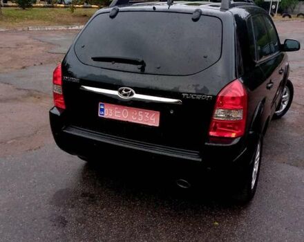 Чорний Хендай Туксон, об'ємом двигуна 2 л та пробігом 225 тис. км за 7850 $, фото 9 на Automoto.ua