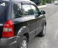 Чорний Хендай Туксон, об'ємом двигуна 2 л та пробігом 142 тис. км за 4650 $, фото 2 на Automoto.ua