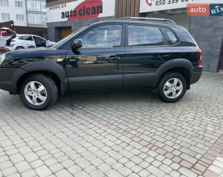 Черный Хендай Туксон, объемом двигателя 1.98 л и пробегом 177 тыс. км за 7600 $, фото 13 на Automoto.ua