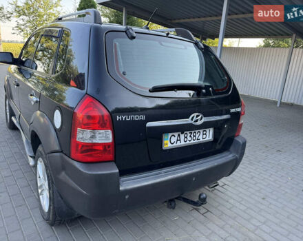 Черный Хендай Туксон, объемом двигателя 2 л и пробегом 290 тыс. км за 5400 $, фото 2 на Automoto.ua