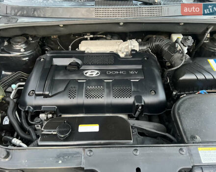 Черный Хендай Туксон, объемом двигателя 2 л и пробегом 276 тыс. км за 7450 $, фото 23 на Automoto.ua