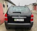 Черный Хендай Туксон, объемом двигателя 2 л и пробегом 270 тыс. км за 7600 $, фото 1 на Automoto.ua