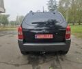 Чорний Хендай Туксон, об'ємом двигуна 2 л та пробігом 186 тис. км за 8300 $, фото 7 на Automoto.ua