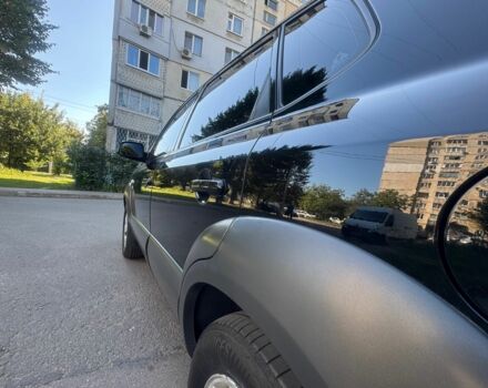 Черный Хендай Туксон, объемом двигателя 2 л и пробегом 228 тыс. км за 7950 $, фото 10 на Automoto.ua