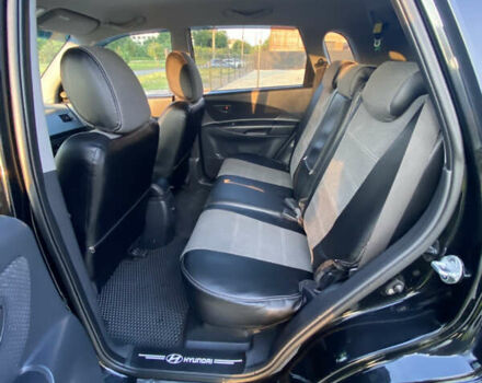 Черный Хендай Туксон, объемом двигателя 1.98 л и пробегом 254 тыс. км за 7700 $, фото 11 на Automoto.ua