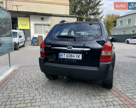 Черный Хендай Туксон, объемом двигателя 1.98 л и пробегом 177 тыс. км за 7600 $, фото 10 на Automoto.ua