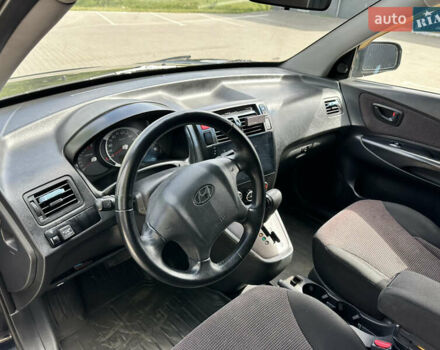 Чорний Хендай Туксон, об'ємом двигуна 1.98 л та пробігом 279 тис. км за 8200 $, фото 22 на Automoto.ua