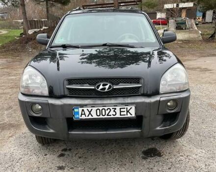 Черный Хендай Туксон, объемом двигателя 1.98 л и пробегом 290 тыс. км за 7000 $, фото 9 на Automoto.ua