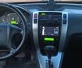 Чорний Хендай Туксон, об'ємом двигуна 1.98 л та пробігом 183 тис. км за 8800 $, фото 6 на Automoto.ua