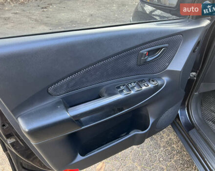 Чорний Хендай Туксон, об'ємом двигуна 2 л та пробігом 240 тис. км за 8500 $, фото 14 на Automoto.ua