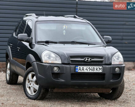 Черный Хендай Туксон, объемом двигателя 2 л и пробегом 252 тыс. км за 7200 $, фото 10 на Automoto.ua