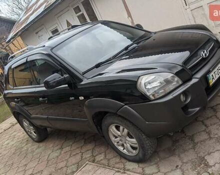 Черный Хендай Туксон, объемом двигателя 2 л и пробегом 163 тыс. км за 8100 $, фото 15 на Automoto.ua