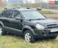 Черный Хендай Туксон, объемом двигателя 2 л и пробегом 148 тыс. км за 9500 $, фото 2 на Automoto.ua