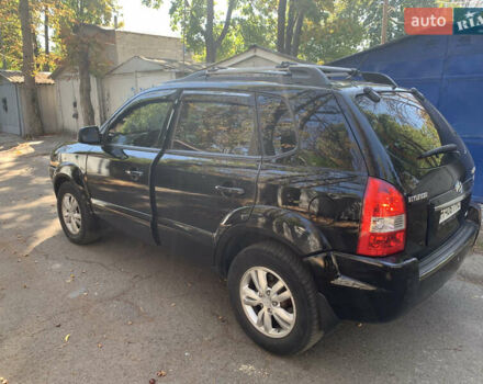 Черный Хендай Туксон, объемом двигателя 1.98 л и пробегом 260 тыс. км за 7777 $, фото 3 на Automoto.ua
