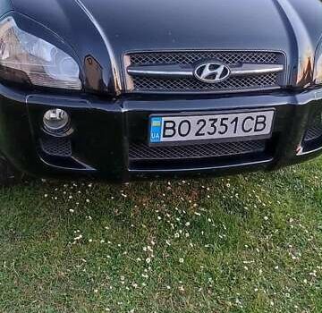 Черный Хендай Туксон, объемом двигателя 1.99 л и пробегом 203 тыс. км за 8000 $, фото 2 на Automoto.ua