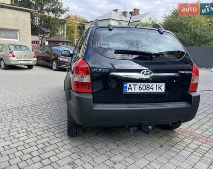 Черный Хендай Туксон, объемом двигателя 1.98 л и пробегом 177 тыс. км за 7600 $, фото 11 на Automoto.ua