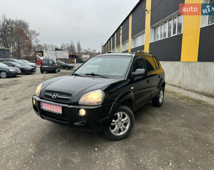 Чорний Хендай Туксон, об'ємом двигуна 2 л та пробігом 243 тис. км за 7999 $, фото 1 на Automoto.ua