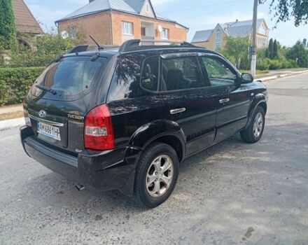 Чорний Хендай Туксон, об'ємом двигуна 2 л та пробігом 260 тис. км за 6750 $, фото 3 на Automoto.ua