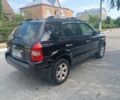 Чорний Хендай Туксон, об'ємом двигуна 2 л та пробігом 260 тис. км за 6750 $, фото 3 на Automoto.ua
