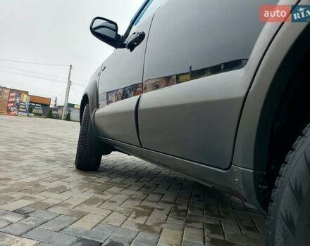 Чорний Хендай Туксон, об'ємом двигуна 2 л та пробігом 225 тис. км за 8000 $, фото 24 на Automoto.ua