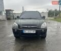 Черный Хендай Туксон, объемом двигателя 1.98 л и пробегом 173 тыс. км за 8800 $, фото 2 на Automoto.ua