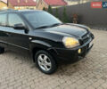 Черный Хендай Туксон, объемом двигателя 2 л и пробегом 276 тыс. км за 7450 $, фото 6 на Automoto.ua