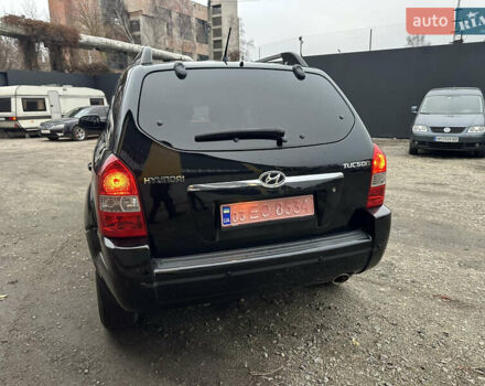 Чорний Хендай Туксон, об'ємом двигуна 2 л та пробігом 243 тис. км за 7999 $, фото 14 на Automoto.ua
