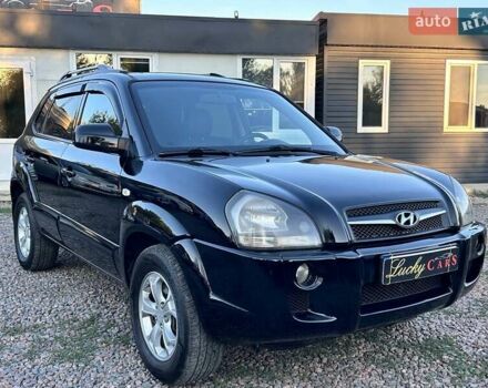 Черный Хендай Туксон, объемом двигателя 2 л и пробегом 230 тыс. км за 7500 $, фото 2 на Automoto.ua