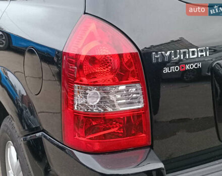 Черный Хендай Туксон, объемом двигателя 2 л и пробегом 192 тыс. км за 7990 $, фото 9 на Automoto.ua