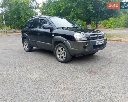 Черный Хендай Туксон, объемом двигателя 1.98 л и пробегом 157 тыс. км за 7500 $, фото 5 на Automoto.ua