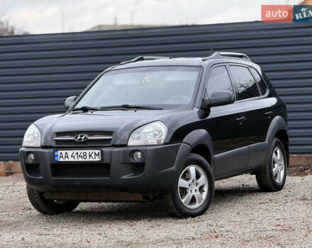 Черный Хендай Туксон, объемом двигателя 2 л и пробегом 252 тыс. км за 7200 $, фото 3 на Automoto.ua