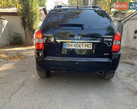 Черный Хендай Туксон, объемом двигателя 1.98 л и пробегом 260 тыс. км за 7777 $, фото 4 на Automoto.ua