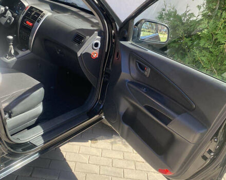 Чорний Хендай Туксон, об'ємом двигуна 1.99 л та пробігом 230 тис. км за 8000 $, фото 9 на Automoto.ua