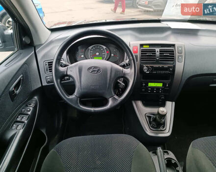 Черный Хендай Туксон, объемом двигателя 2 л и пробегом 192 тыс. км за 7990 $, фото 14 на Automoto.ua