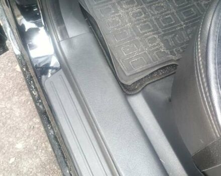 Черный Хендай Туксон, объемом двигателя 1.98 л и пробегом 283 тыс. км за 8800 $, фото 12 на Automoto.ua