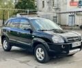 Черный Хендай Туксон, объемом двигателя 1.98 л и пробегом 172 тыс. км за 8500 $, фото 3 на Automoto.ua